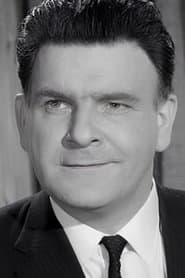 Godfrey Quigley as Prison Chaplain